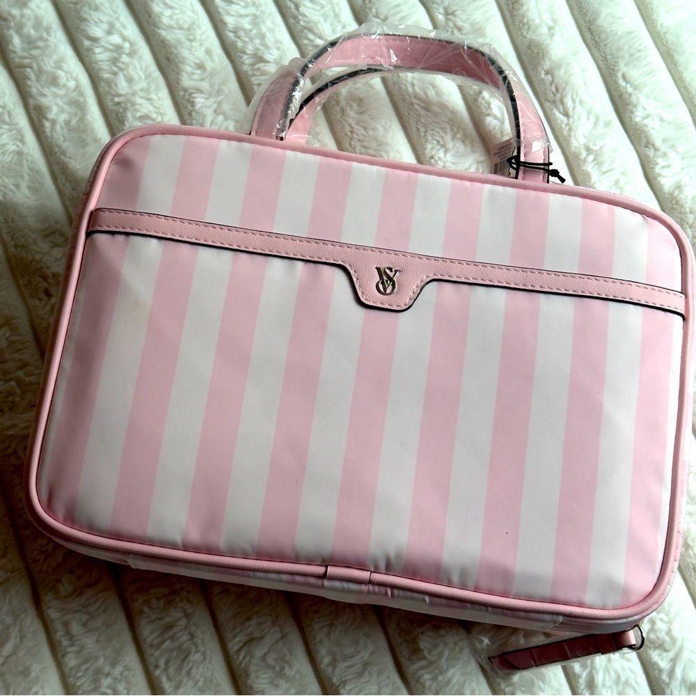 NWT Victoria Secret 

Color: pink white stripes 
Travel Toiletry Bag